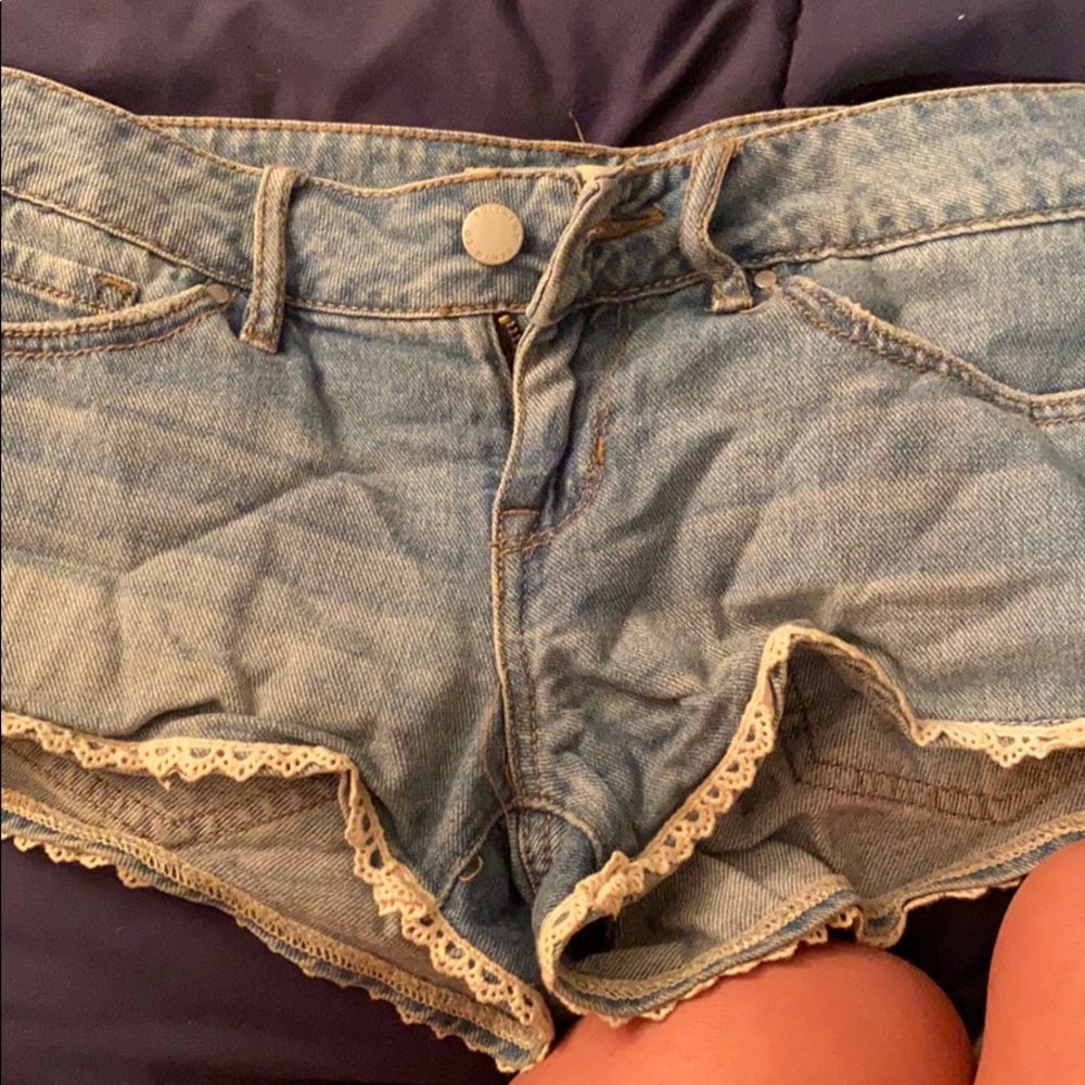 Lace accented jean shorts